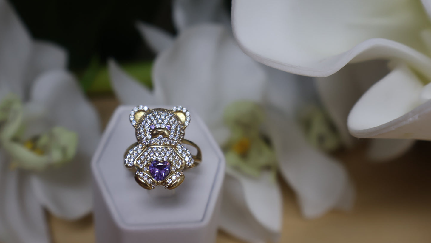 anillo de osito con circonia blanca y violeta en oro 10k
