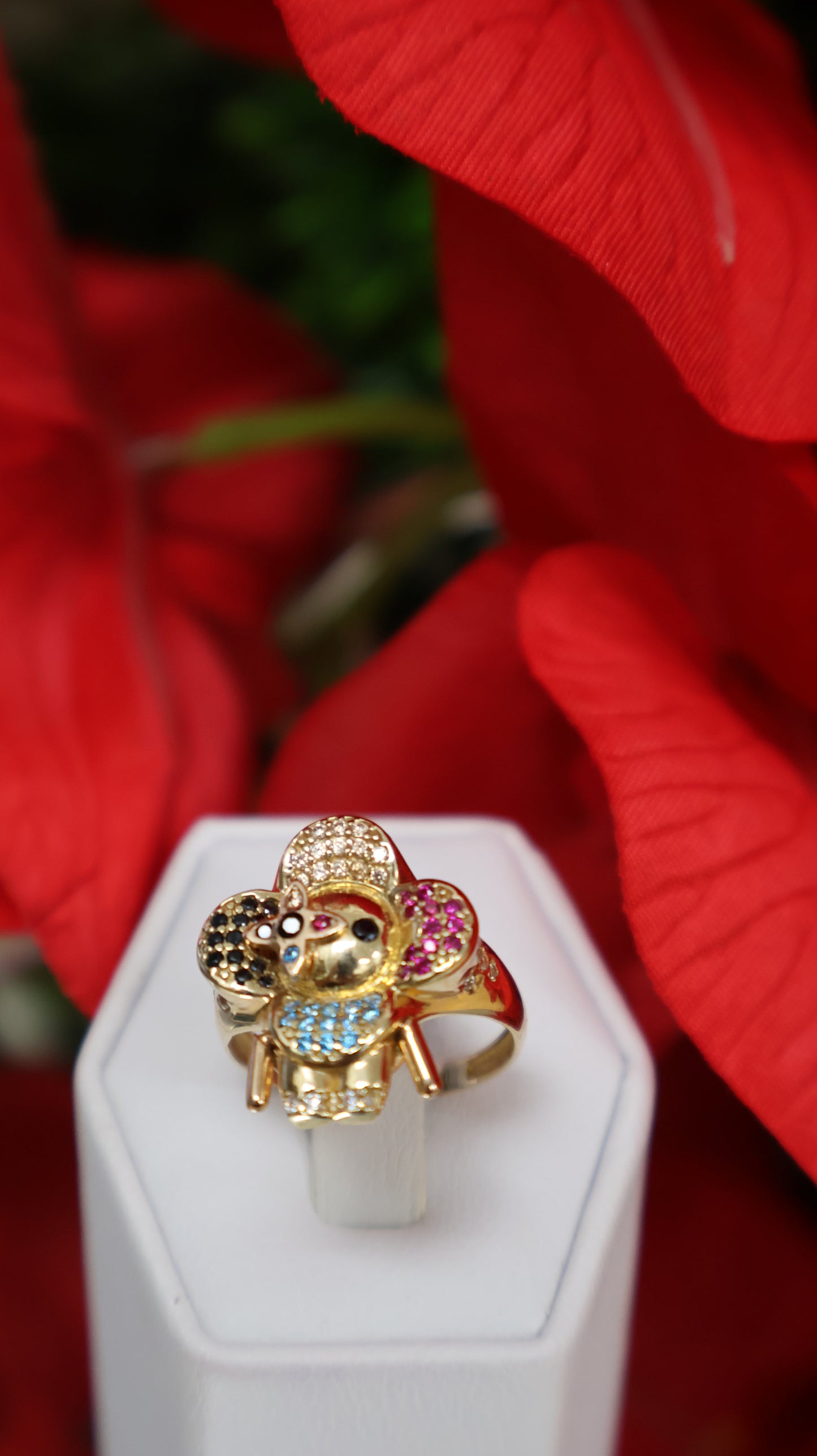 anillo de mujer 14k es mobible se mueben las manito con circonia ,negra, roja ,azul ,blanca.