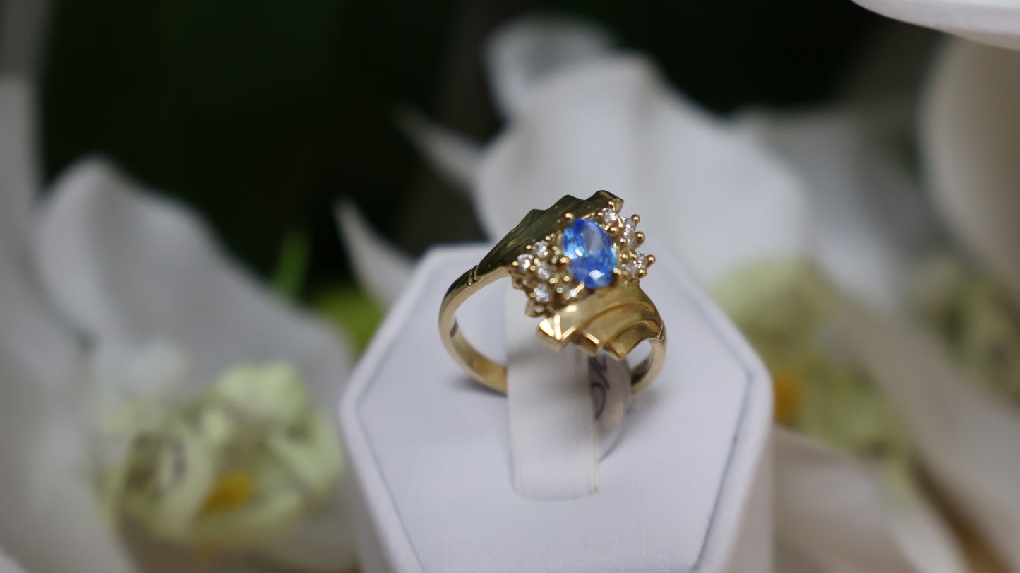 anillo de mujer 10k con piedra azul y circonia blanca
