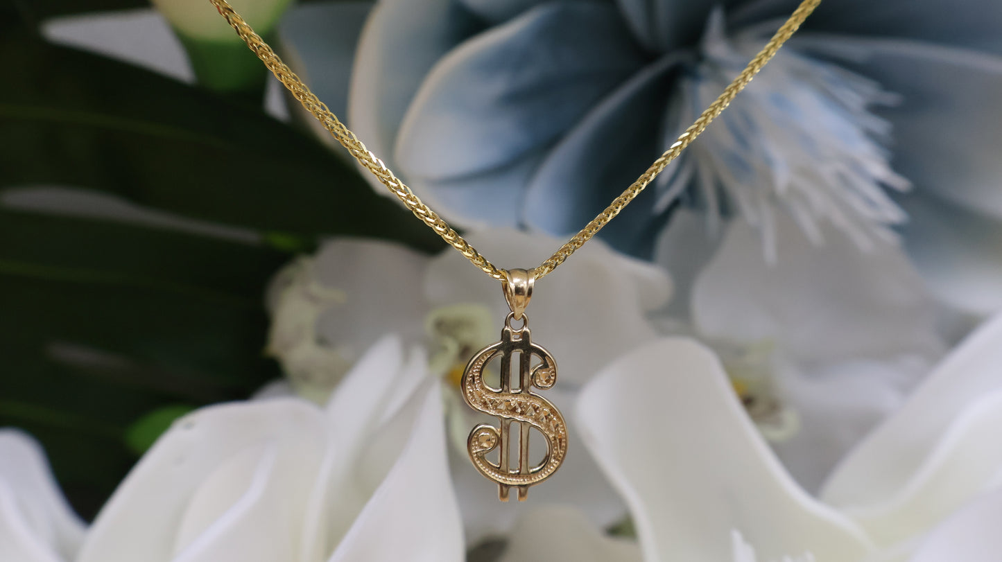 Dije de 10k de el signo de $ en oro 10k