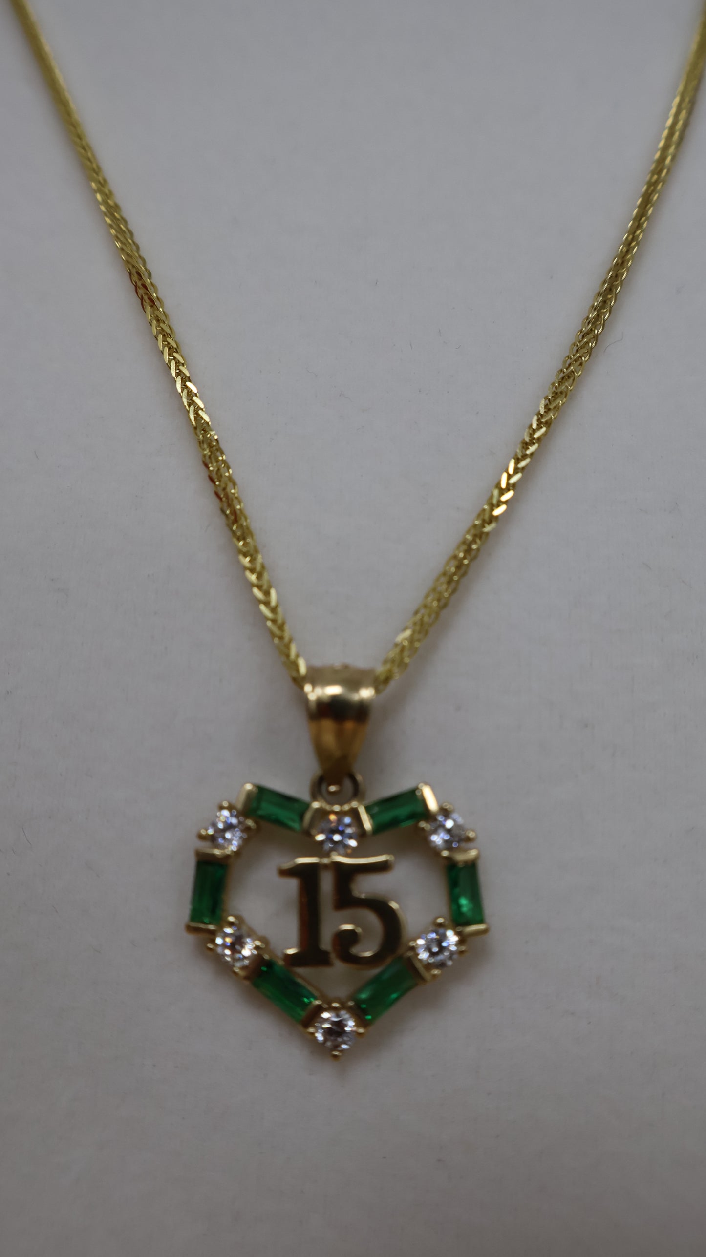 Dije de 14k corazon para 15 anos