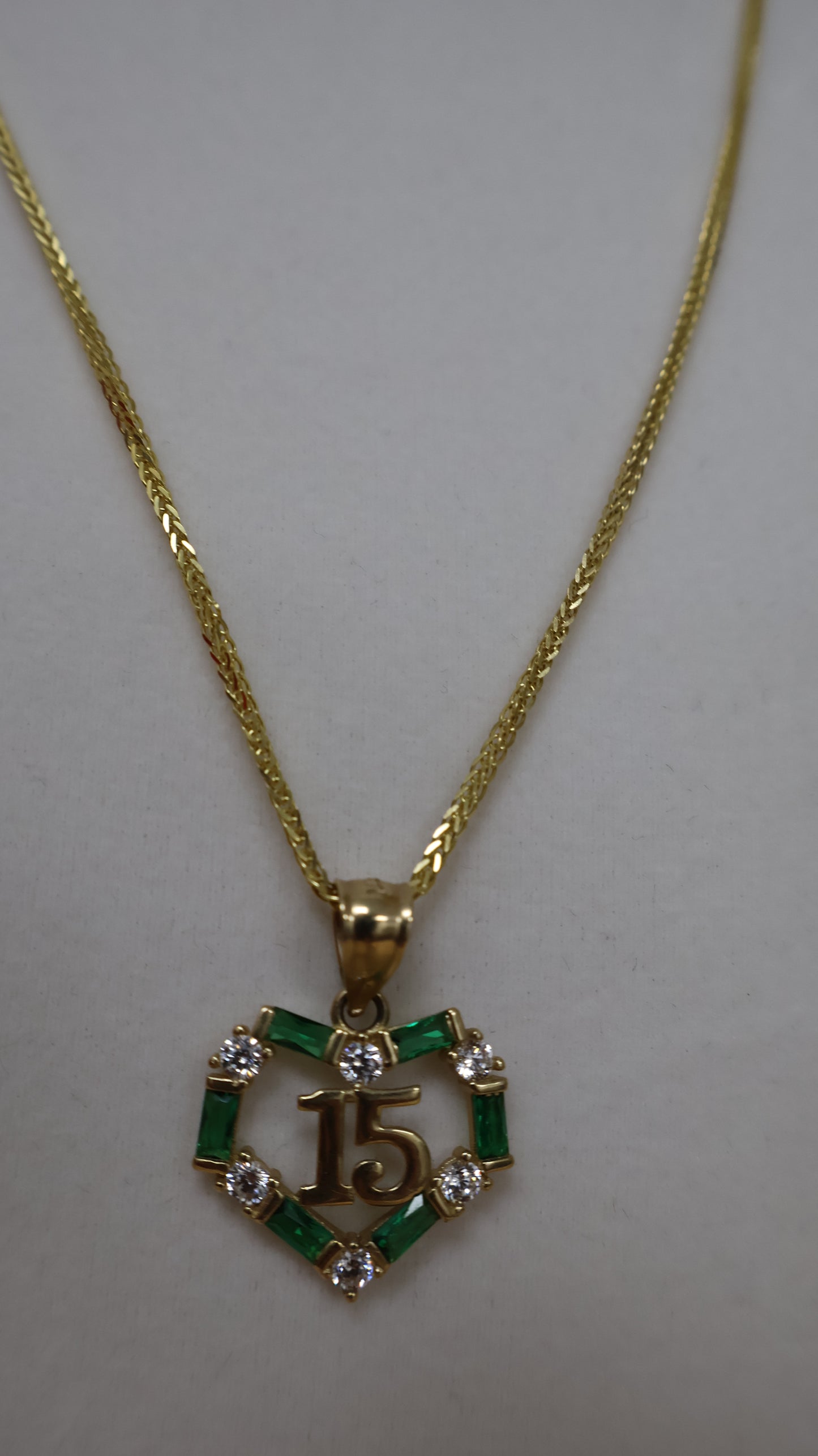 Dije de 14k corazon para 15 anos