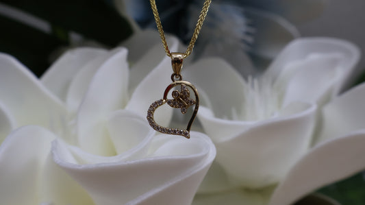 Dije de 10k corazon con maripoza y circonia blanca