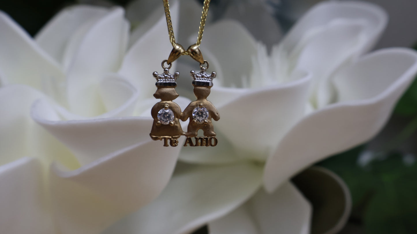 Dije de 10k pareja de nino con circonia en blanca