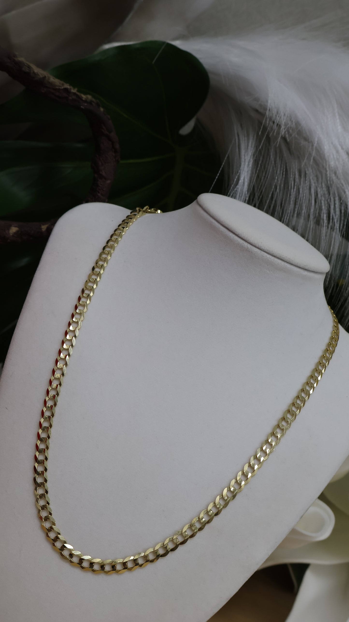 10k gold Cuban style chain with heart medal