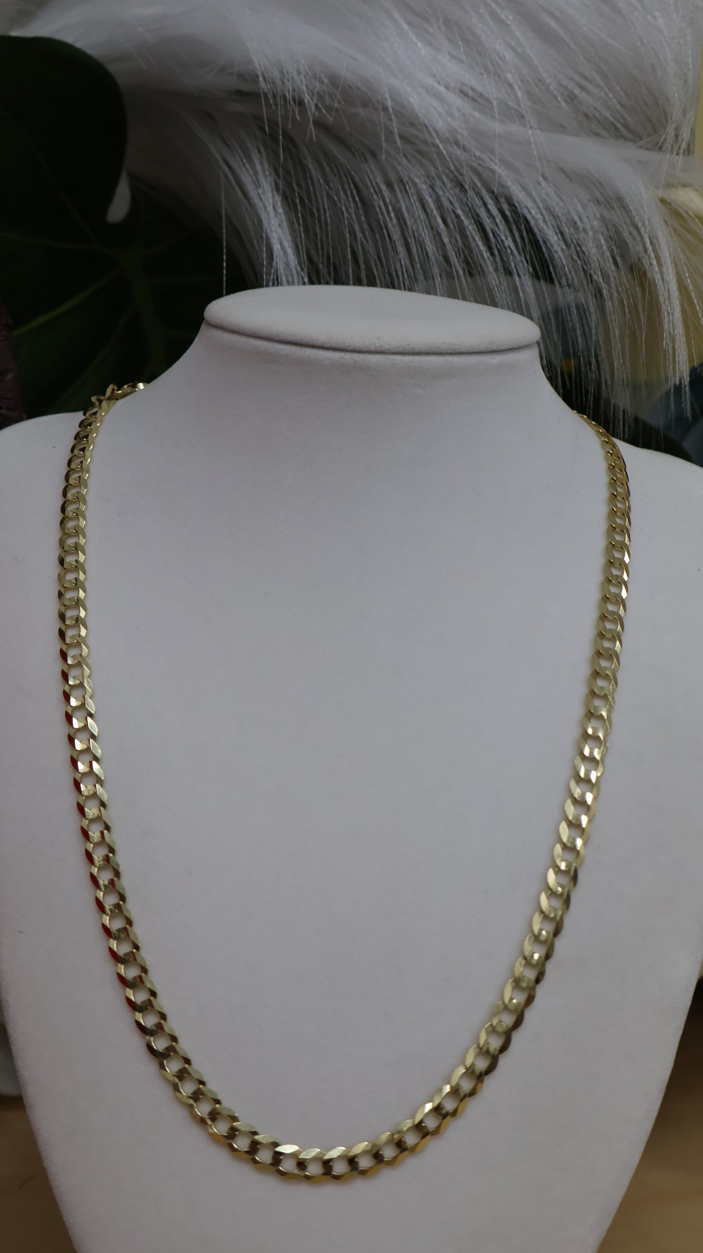 10k gold Cuban style chain with heart medal