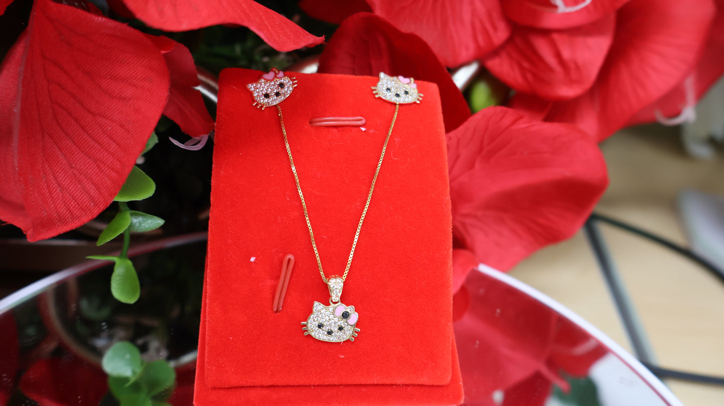 Conjunto de arete con la cadena y el dije de Hello Kitty en oro 10k