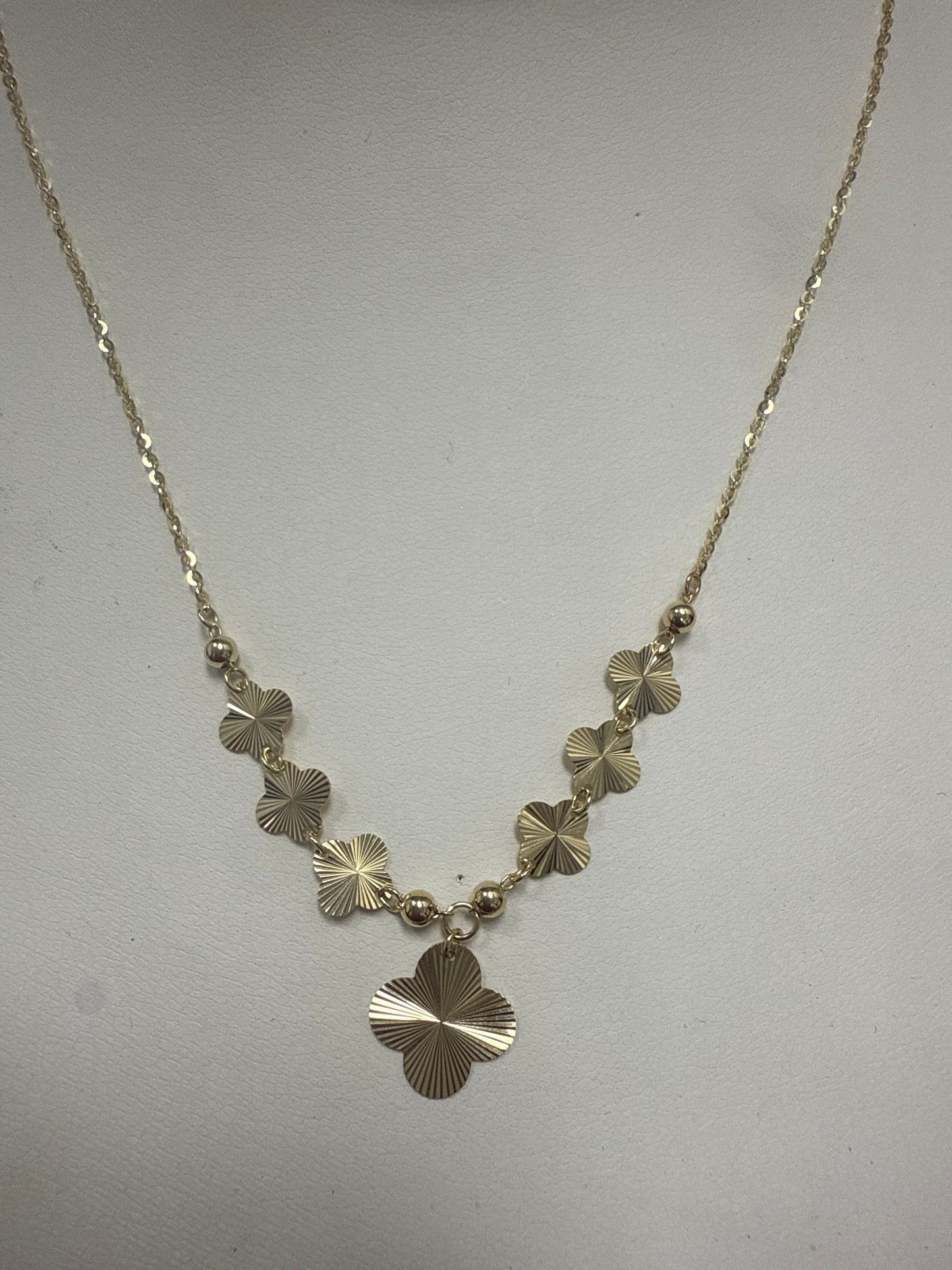 cadenita de flores muy fina de oro 10k