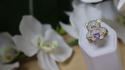 anillo de osito con circonia blanca y violeta en oro 10k