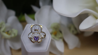 anillo de osito con circonia blanca y violeta en oro 10k