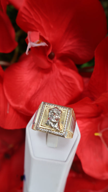 anillo de 14k con cristo y ciconia