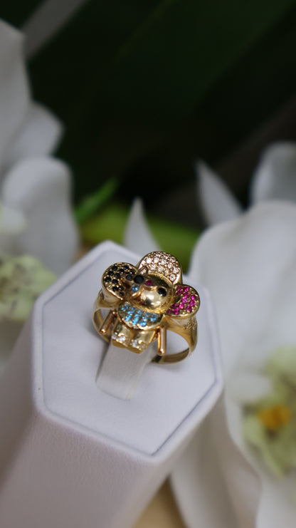 anillo de mujer 14k es  mobible se mueben las manito con  circonia ,negra, roja ,azul ,blanca.