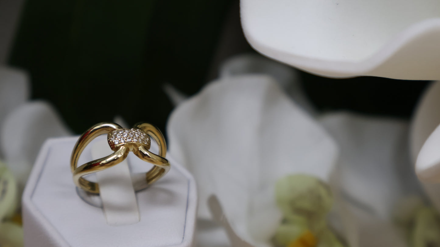 anillo de mujer 14k  diseno de lazo con circonia  en blanca