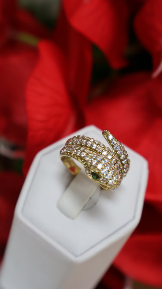 anillo de mujer de  14k  con  serpiente y ojos verde