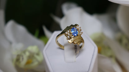 anillo de mujer 10k con piedra azul y circonia blanca
