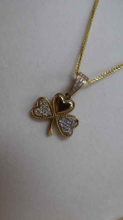 Dije de flor con circonia de oro 10k