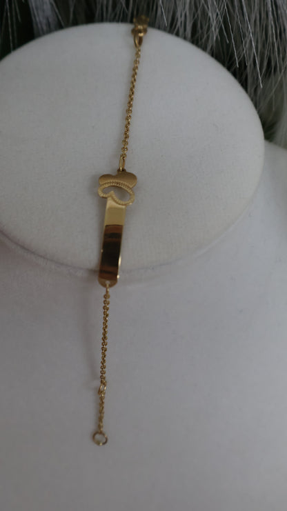 manilla para ninos con un diseno en la placa en oro 10k